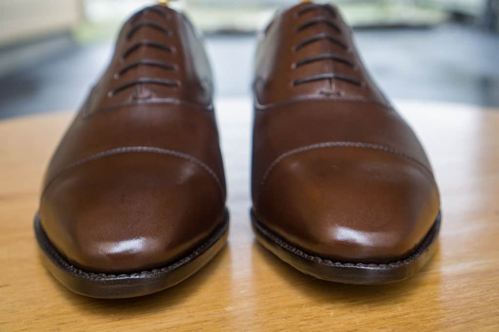 The shoes from Crownhill have got a small shine, but  not something exceptional. Would need more time to gain the same shine as the Lobb's.